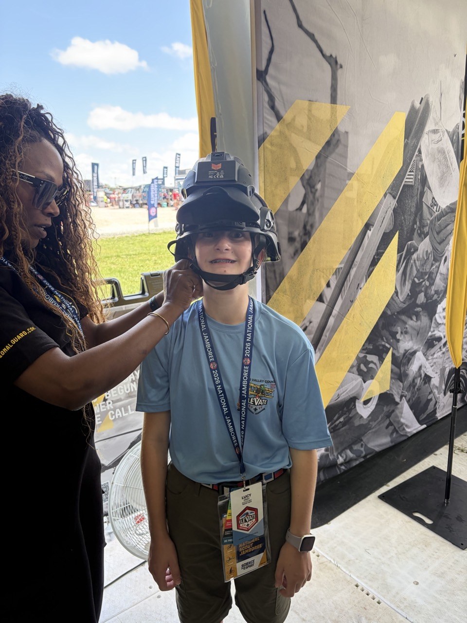 Lucy trying a virtual reality experience at the Jamboree