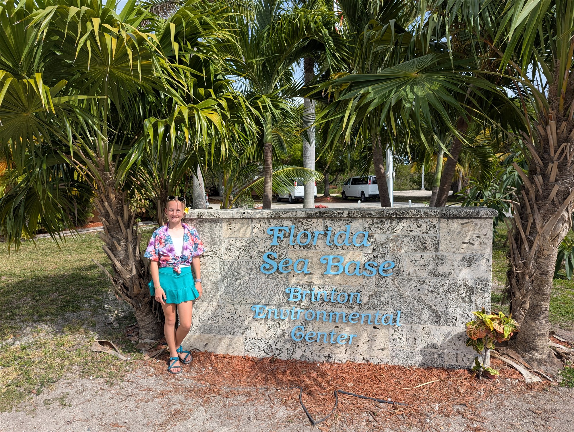 Lucy beside the Florida Sea Base sign